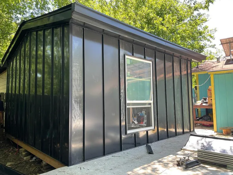 Black standing seam metal wall panels for Roof Inspection in Elma